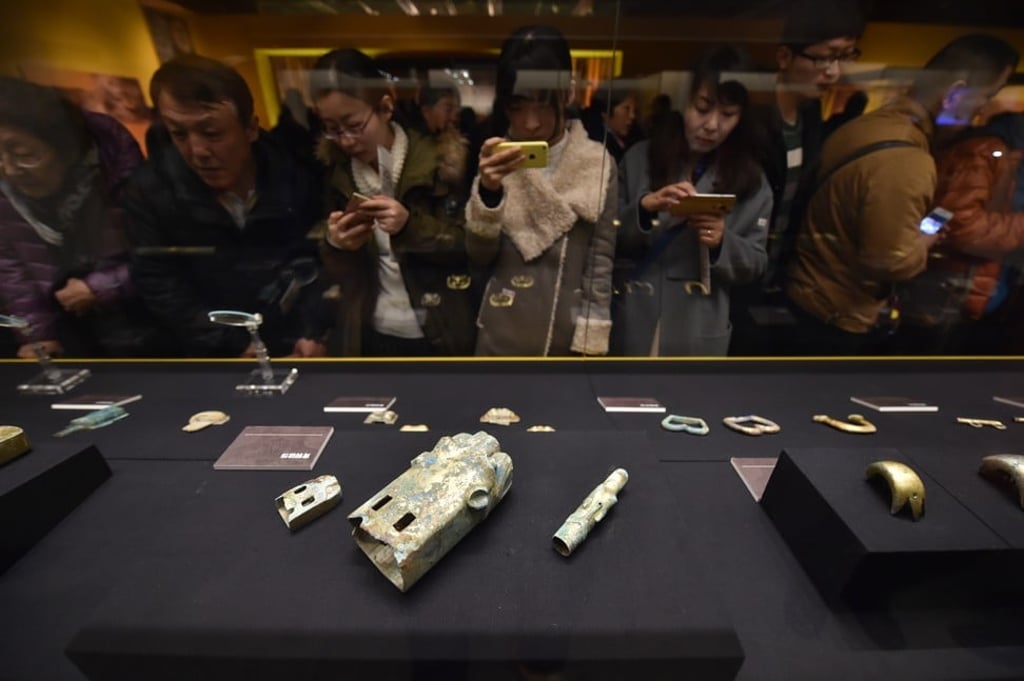 Cultural relics were unearthed from the 2,000-year-old tomb of Liu He, on display in Beijing's Capital Museum. Photo: Xinhua