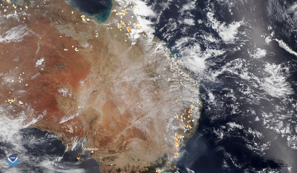 A satellite image of part of mainland Australia showing where bush fires still rage in the southeastern states and territories. Photo: EPA A satellite image of part of mainland Australia showing where bush fires still rage in the southeastern states and territories. Photo: EPA