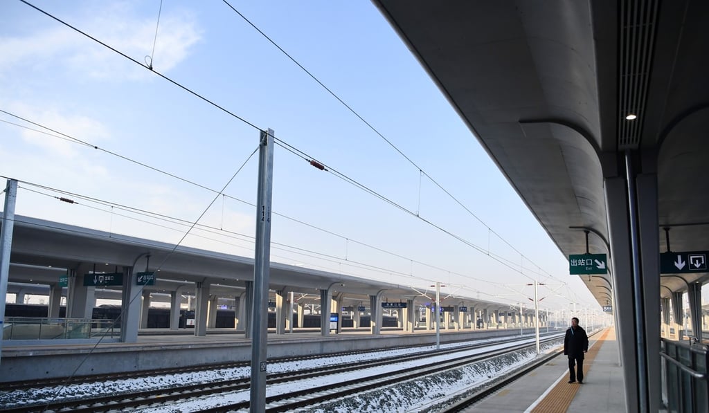A staff member patrols the platform of the Zhangjiakou High-speed Railway Station on Sunday. Photo: Xinhua