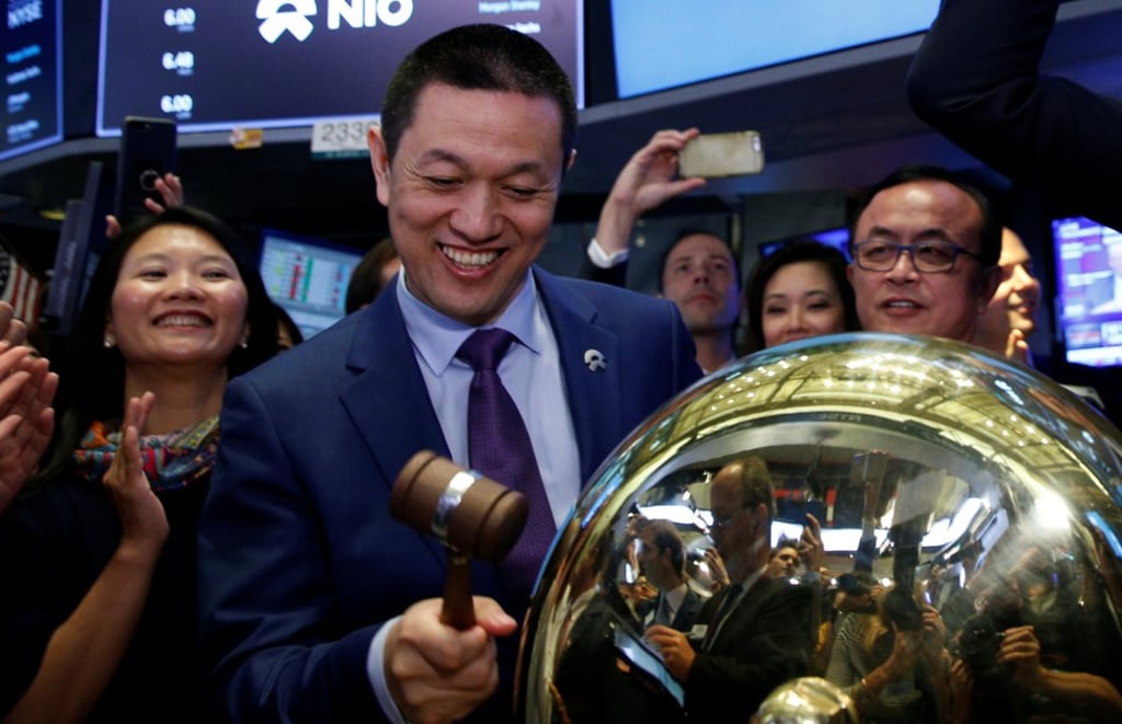 William Li Bin, chief executive of Chinese electric vehicle maker NIO, rings a ceremonial bell as the company’s shares began trading on the floor of the New York Stock Exchange on September 12, 2018. Photo: Reuters