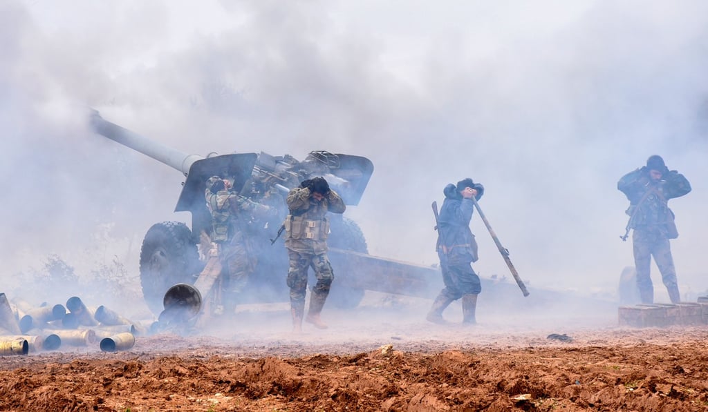 Syrian government forces firing at positions of rebel fighters. Photo: AFP Syrian government forces firing at positions of rebel fighters. Photo: AFP