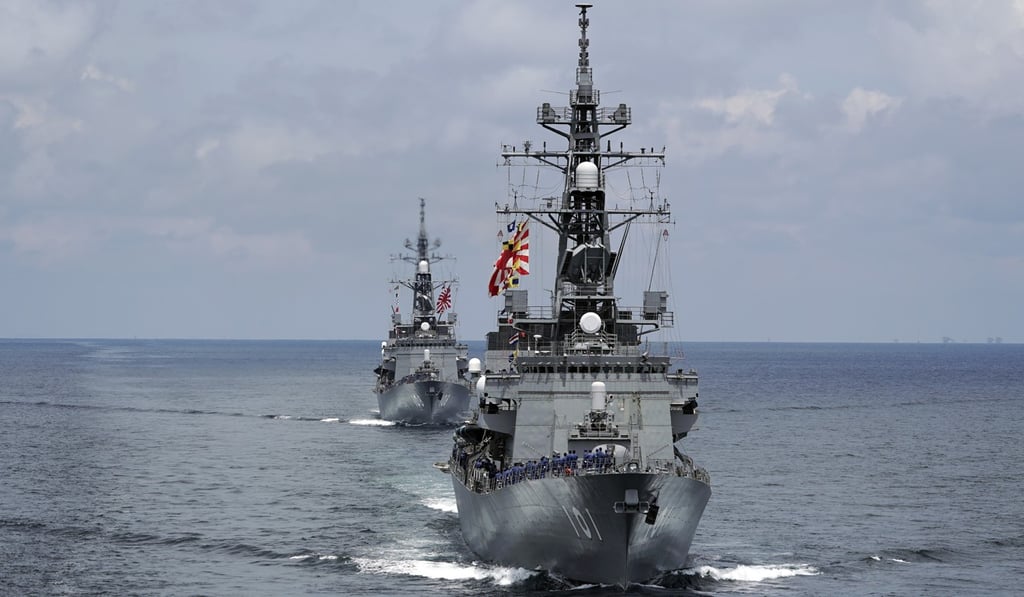 Japan's Maritime Self-Defence Force destroyers JS Murasame and JS Akebono take part in a military drill. Photo: AP