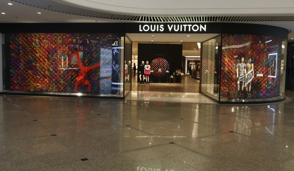 The Louis Vuitton store in Times Square occupies prime space on the second floor of the luxury mall. Photo: Antony Dickson