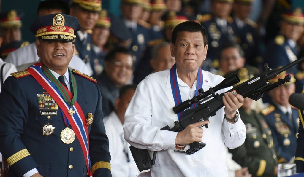 Former national police chief Ronald dela Rosa (left) may be the target of US human rights sanctions. Photo: Reuters