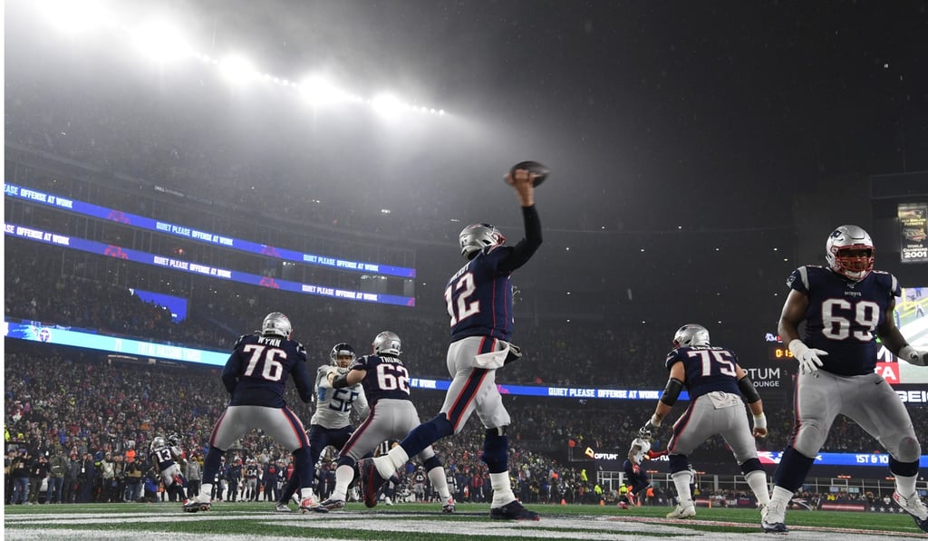 New England Patriots quarterback Tom Brady throws an interception to the Tennessee Titans for a touchdown in the final seconds of their AFC wild card play-off game. Photo: EPA