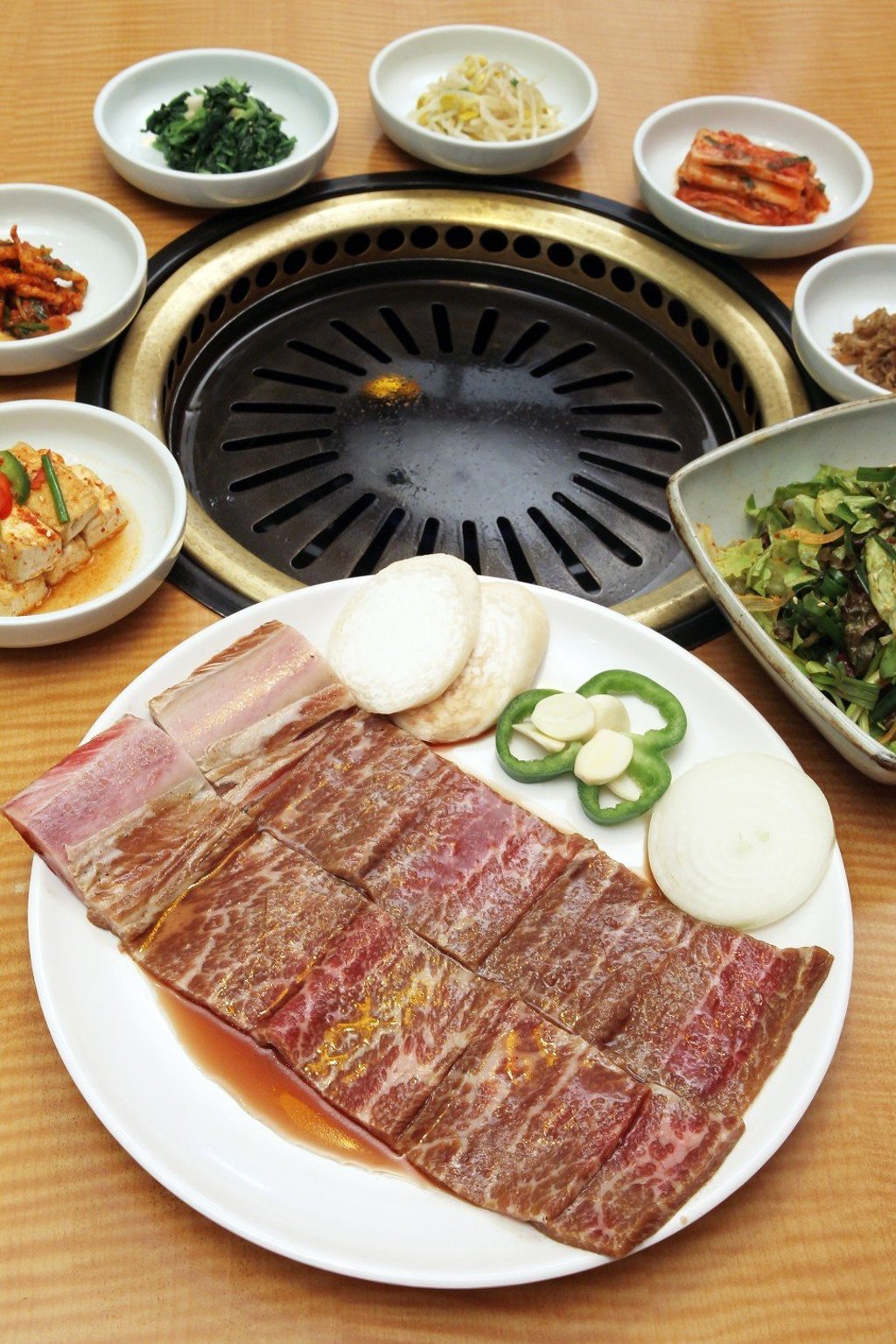 Unseasoned double size special short rib for guests to cook at Arirang Korean Restaurant. Photo: Edward Wong