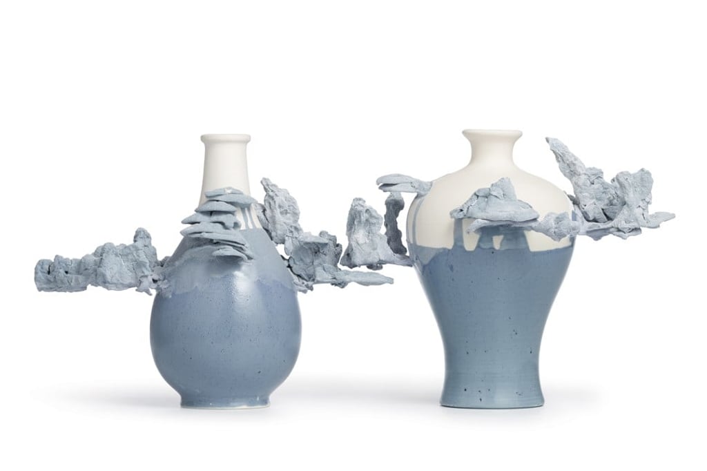 Two vases from Latitude 22N’s “Without Leaving the Room” exhibition series featuring the melted glaze effect.