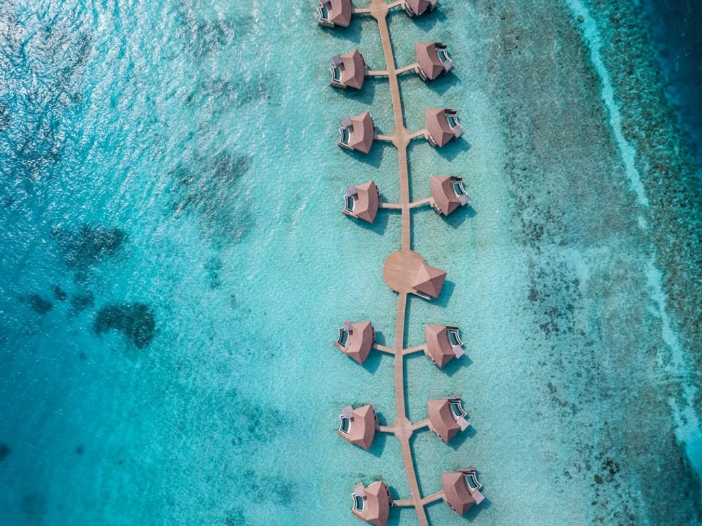 The InterContinental Maldives Maamunagau Resort has 81 exotic villas atop crystal clear waters.