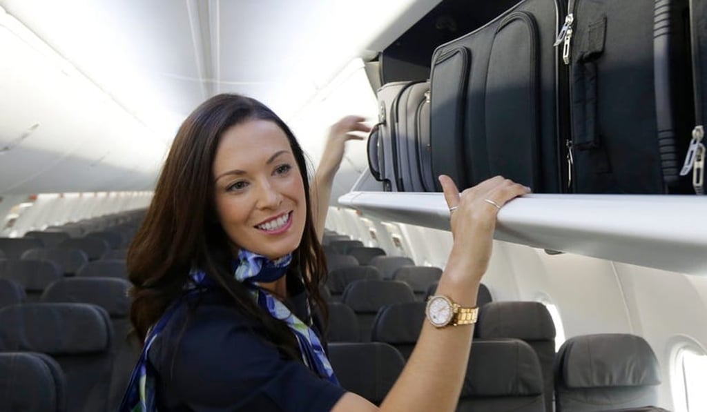 Travelling without luggage might look ‘odd’ to your flight attendant. Photo: AP Travelling without luggage might look ‘odd’ to your flight attendant. Photo: AP