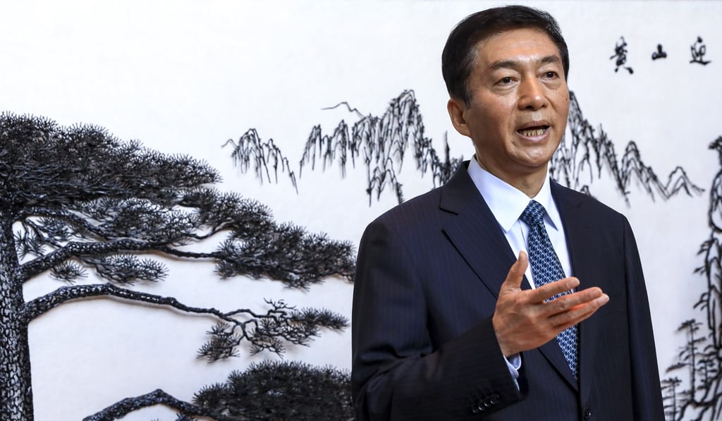 Luo Huining addresses the media on his first day as head of the central government’s liaison office in Hong Kong on Monday. Photo: May Tse Luo Huining addresses the media on his first day as head of the central government’s liaison office in Hong Kong on Monday. Photo: May Tse
