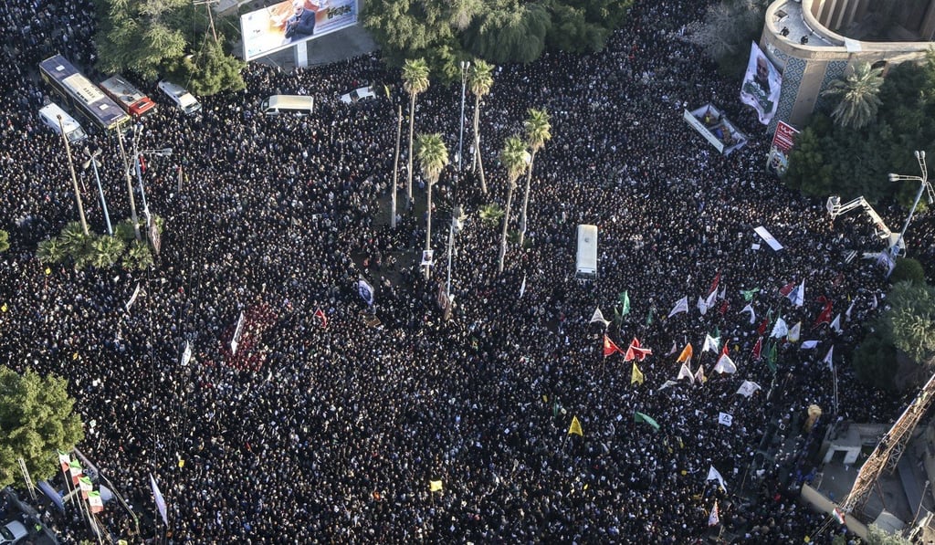 An aerial view shows mourners attending a funeral procession for General Qassem Soleimani and others who were killed in a US drone strike in Iraq. Photo: AP