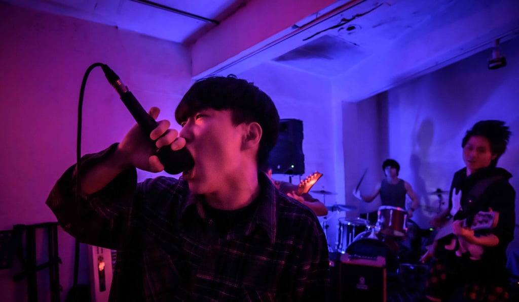 Chu Yeonsik is the singer of Monsters Dive. He works part-time jobs to support himself. Photo: Ed Jones/AFP