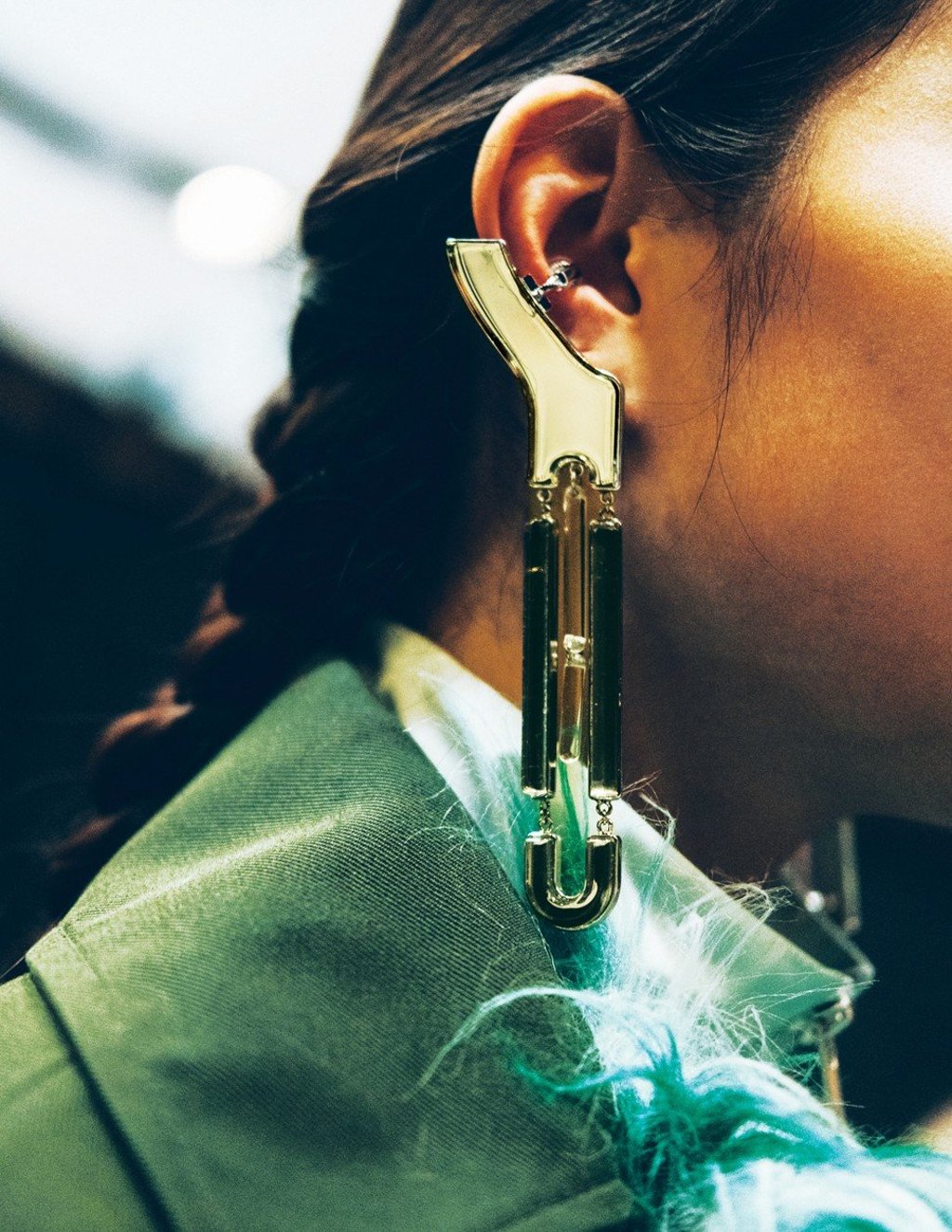 Kenzo released a pair of long earring in the shape of a thick paper clip. Photo: Handout Kenzo released a pair of long earring in the shape of a thick paper clip. Photo: Handout