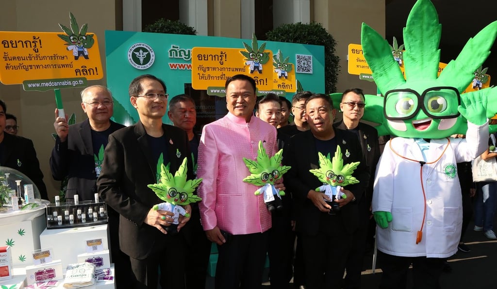 Deputy Prime Minister Anutin Charnvirakul (second left) holds a Dr Ganja toy during an event in Bangkok. Photo: Ministry of Public Health Deputy Prime Minister Anutin Charnvirakul (second left) holds a Dr Ganja toy during an event in Bangkok. Photo: Ministry of Public Health