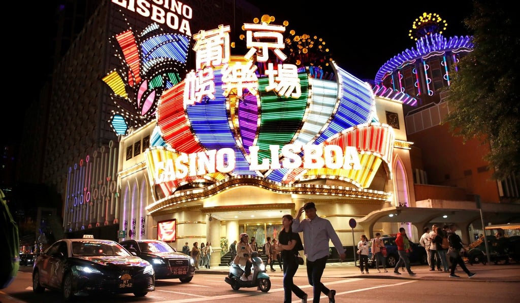 People walk in front of Casino Lisboa in Macau in December 2019. Photo: Reuters
