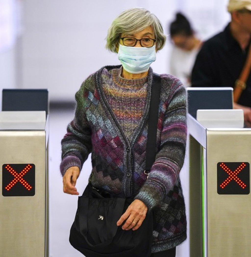 Passengers at the West Kowloon High-Speed Railway Station in Hong Kong wear masks as a precaution following the outbreak of an unidentified form of pneumonia in Wuhan, China. Photo: Sam Tsang