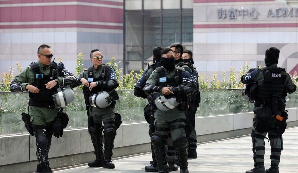 Special police from the Correctional Services Department patrol in Central. Photo: Xiaomei Chen