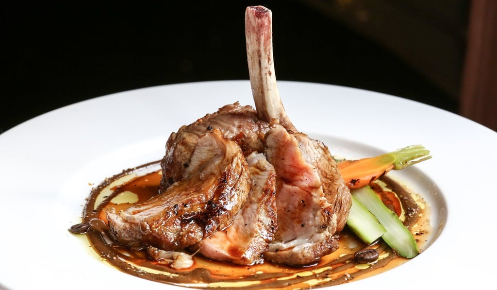 Veal chop grilled with olive oil and house-made coffee mustard at Gaia. Photo: Jonathan Wong