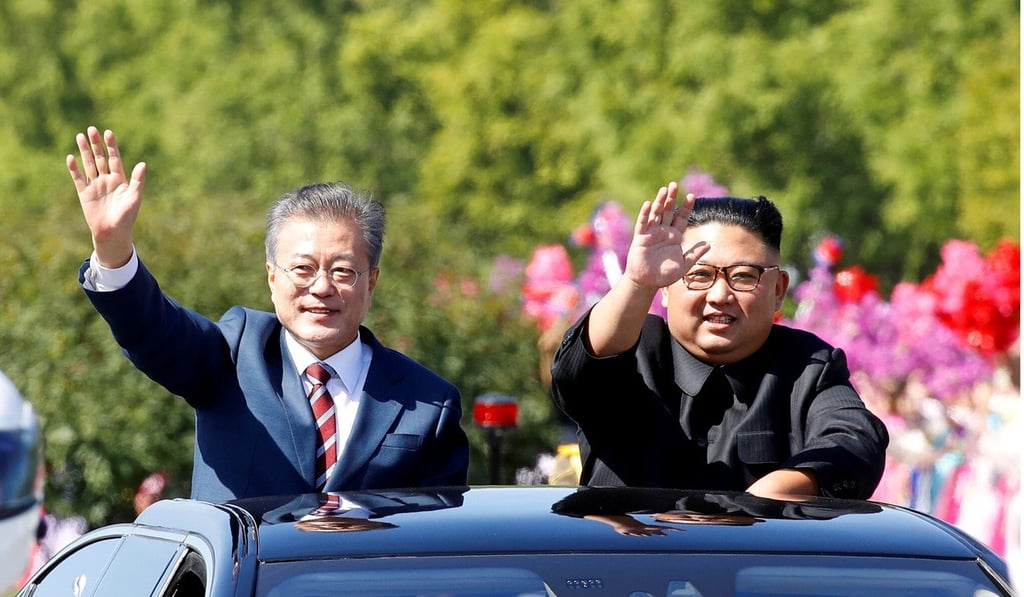 South Korean President Moon Jae-in and North Korean leader Kim Jong-un wave during a car parade in Pyongyang, North Korea, in September 2018. Photo: Reuters