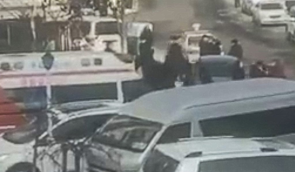 Police in Hohhot, capital of Inner Mongolia, responded after three people were taken by an armed man on Sunday morning. Photo: Weibo