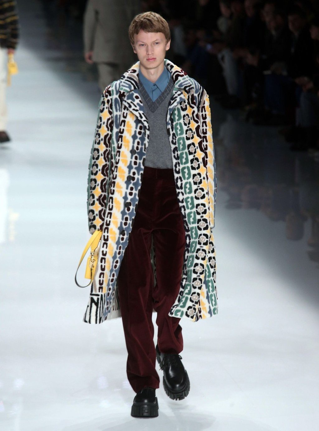 A model presents a creation by Fendi during the Milan Fashion Week Men’s, in Milan, Italy. The coats appeared in three-tone fur or wool, changing with each removable panel. Photo: Matteo Bazzi/EPA-EFE