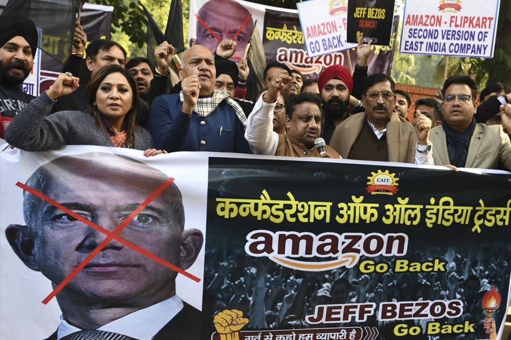 Indian traders hold placards during a demonstration demanding the closure of online shopping platforms Amazon.com and Flipkart in New Delhi on January 15. Photo: Agence France-Presse Indian traders hold placards during a demonstration demanding the closure of online shopping platforms Amazon.com and Flipkart in New Delhi on January 15. Photo: Agence France-Presse