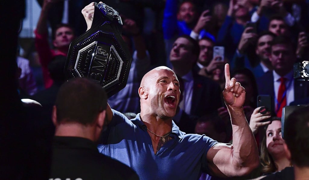 Dwayne ‘the Rock’ Johnson holds the ‘BMF’ belt ahead of the bout between Jorge Masvidal and Nate Diaz. Photo: AFP