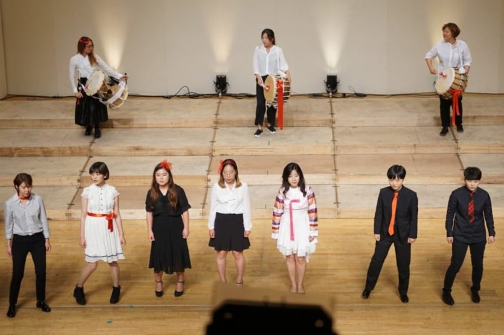 The Unnie Choir performs one of their songs. The Unnie Choir performs one of their songs.