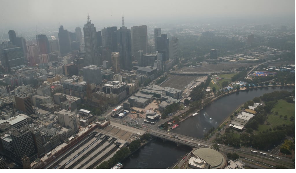 Haze from bush fires hangs over Melbourne’s central business district. Photo: Reuters