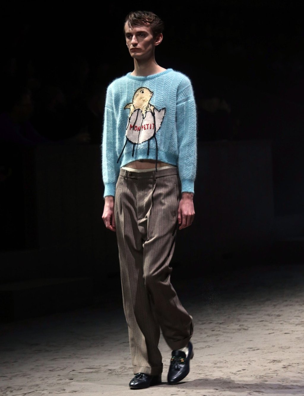 A model presents a creation by Gucci during the Milan Fashion Week, in Milan, Italy. Photo: Matteo Bazzi/EPA-EFE A model presents a creation by Gucci during the Milan Fashion Week, in Milan, Italy. Photo: Matteo Bazzi/EPA-EFE