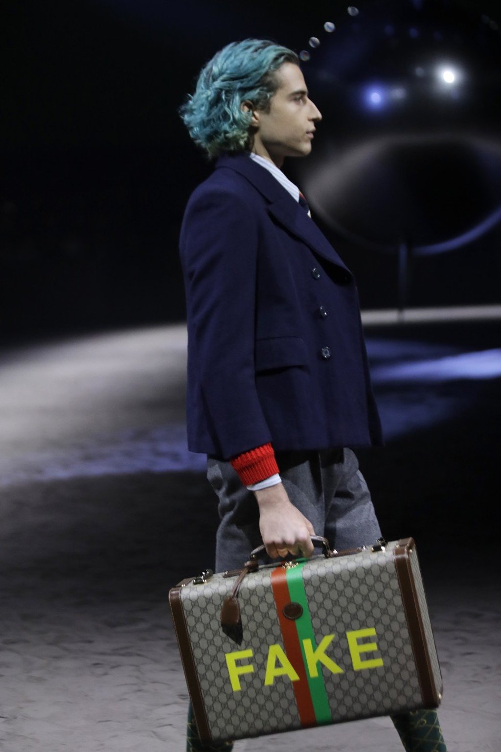 A model in the Gucci men’s Fall/Winter 2020-21 collection presented in Milan, Italy. Photo: Luca Bruno/AP Photo A model in the Gucci men’s Fall/Winter 2020-21 collection presented in Milan, Italy. Photo: Luca Bruno/AP Photo