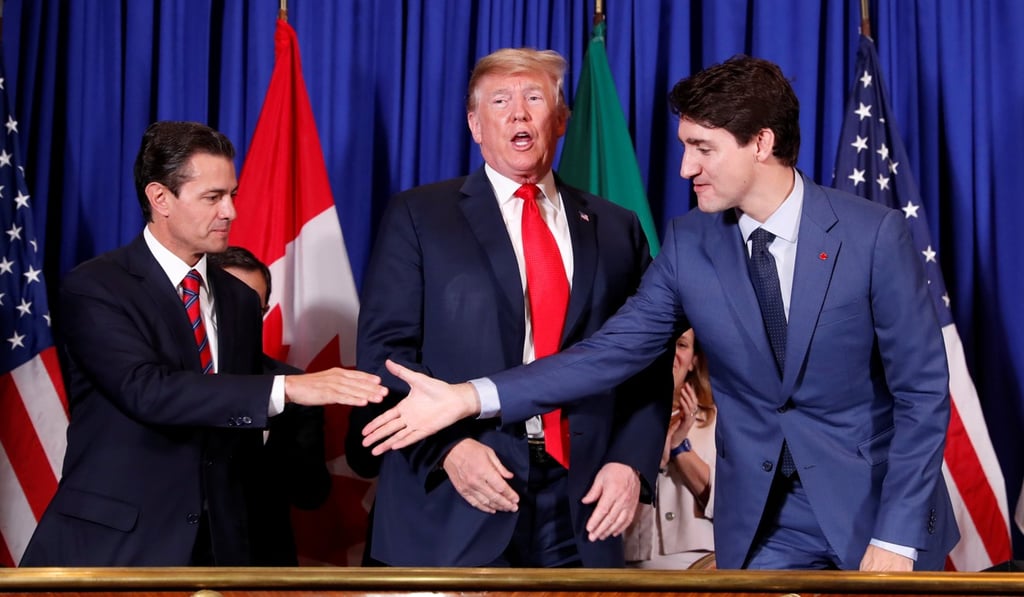 Then-Mexican President Enrique Pena Nieto, US President Donald Trump and Canadian Prime Minister Justin Trudeau at the USMCA signing ceremony in Buenos Aires, Argentina, in November 2018. Photo: Reuters