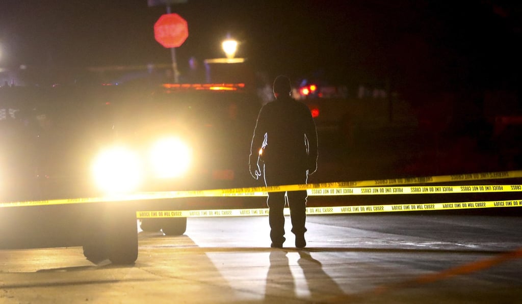 Police investigate after four people were killed and fifth person was injured in a shooting at a Grantsville, Utah, home Friday. Photo: Handout via AP
