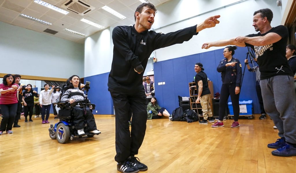 Redouan Ait Chitt (centre) says dancing helped him understand his body better and discover possibilities with it. Photo: Jonathan Wong