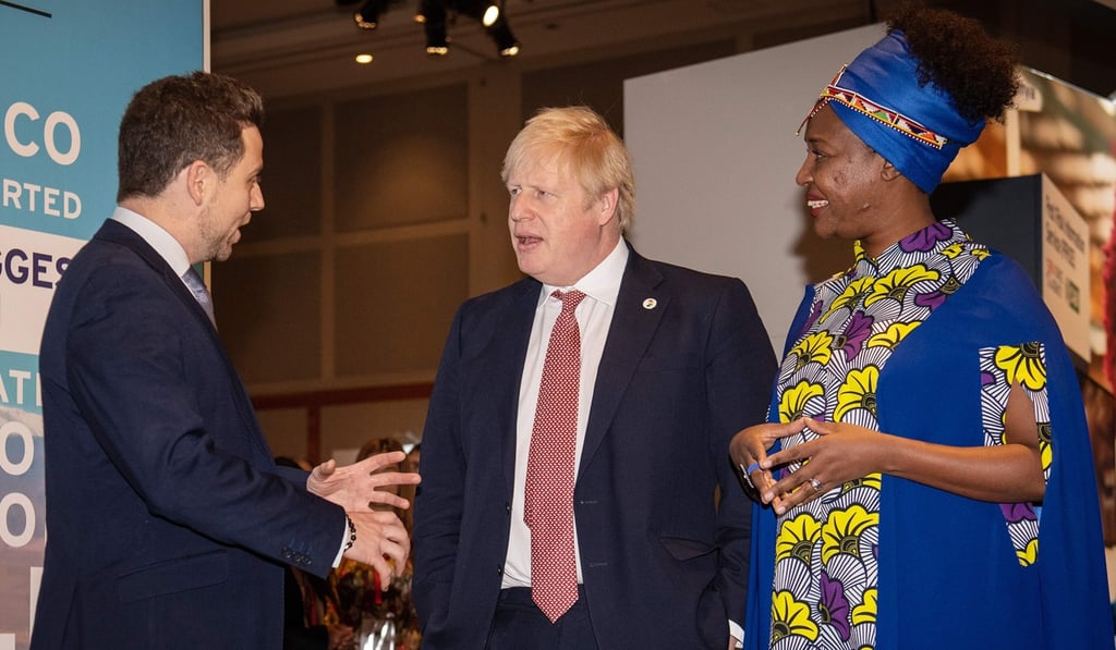 Britain's Prime Minister Boris Johnson, reacts as he visits the Pavegen's stand, a company that converts footsteps into energy, in the Innovation Zone at the UK-Africa Investment Summit in London. Photo: AFP