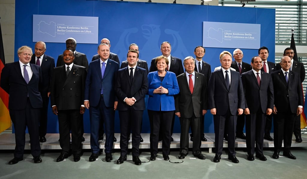 Delegates from Europe and China at the Libya conference in Berlin took time for sidelines discussions on trade. Photo: AFP Delegates from Europe and China at the Libya conference in Berlin took time for sidelines discussions on trade. Photo: AFP