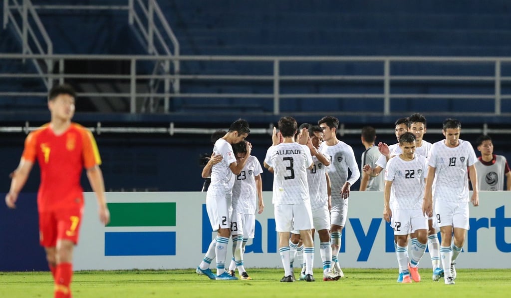 Uzbekistan celebrate a goal during a win that ensured China could not qualify for the Tokyo 2020 Olympics. Photo: Xinhua