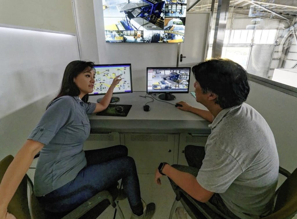 The husband-and-wife team of Kwok (left) and Pong in the control room at the Battery Recycling Centre in Tuen Mun. Photo: Martin Williams