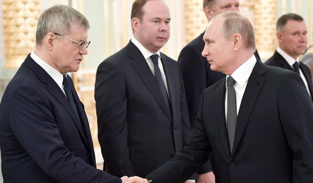 Russian President Vladimir Putin (right) shakes hands with Prosecutor General Yuri Chaika in Moscow in April. Putin removed Chaika on Monday and nominated a replacement. Photo: AFP Russian President Vladimir Putin (right) shakes hands with Prosecutor General Yuri Chaika in Moscow in April. Putin removed Chaika on Monday and nominated a replacement. Photo: AFP