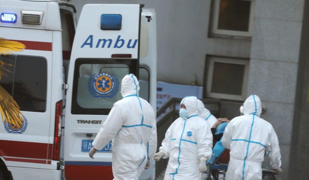 Medical staff transfer patients to Jinyintan hospital where patients infected with a new strain of Coronavirus identified as the cause of the Wuhan pneumonia outbreak are treated in Wuhan, Hubei province, China. Photo: EPA-EFE