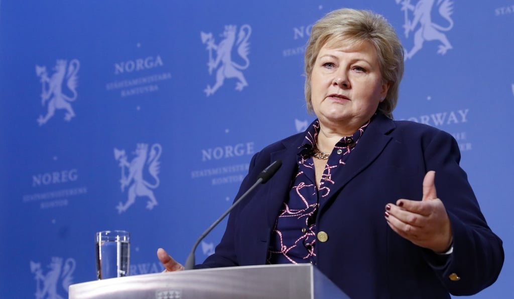 Norwegian Prime Minister Erna Solberg speaks at a media conference in Oslo after the Progress Party pulls out of the governing coalition on Monday. Photo: EPA-EFE
