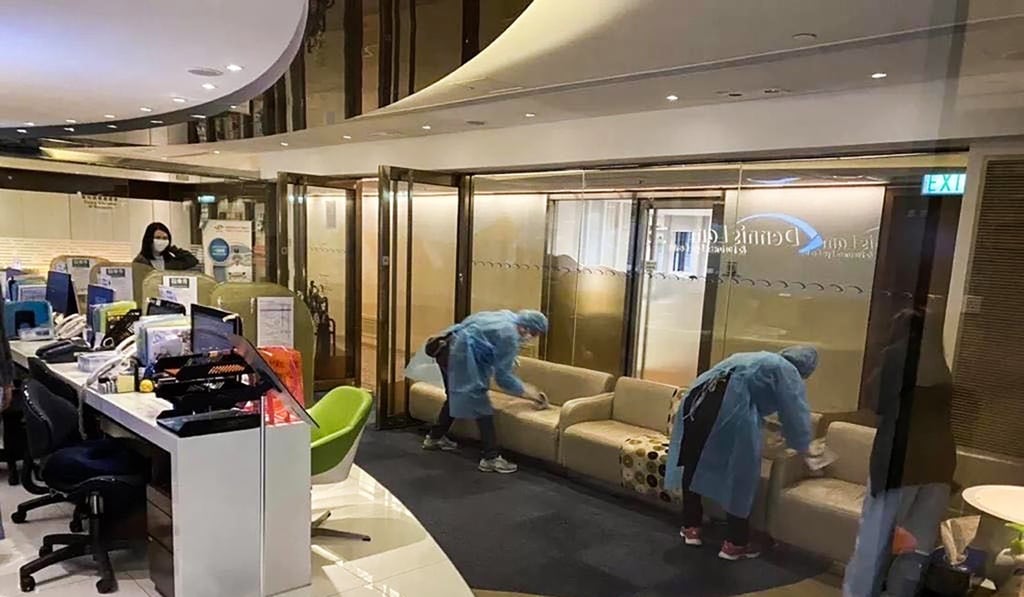 Staff in the Central Building begin the process of sterilising the clinic the family had attended. Photo: Handout