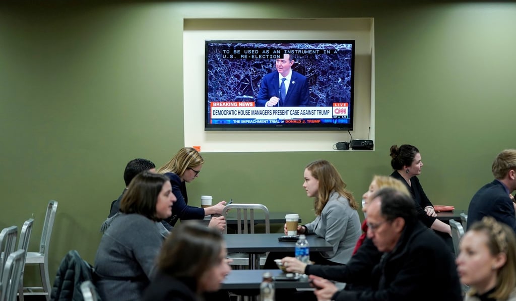 The impeachment trial is displayed in a break room on Capitol Hill. Photo: Reuters
