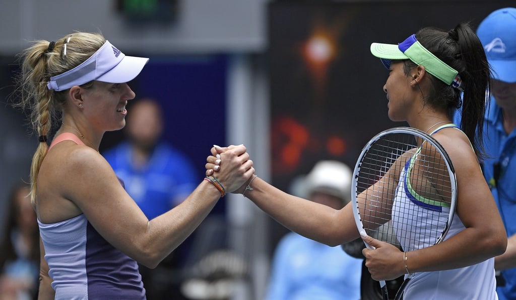 Germany's Angelique Kerber (left) is congratulated by Australia's Priscilla Hon after winning their second round match at the Australian Open. Photo: AP Germany's Angelique Kerber (left) is congratulated by Australia's Priscilla Hon after winning their second round match at the Australian Open. Photo: AP