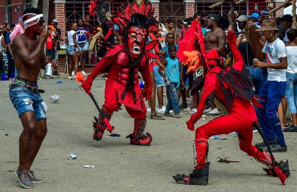 Revellers in the Congos and Devils carnival festival in Panama, a celebration dating back to colonial times, with congos representing African slaves and devils the Spanish conquerors. Photo: AFP