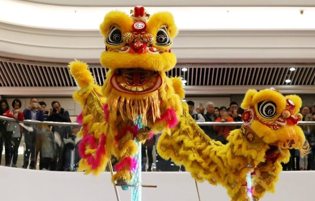 A lion dance at Times Square in Causeway Bay, Hong Kong. Photo: Nora Tam