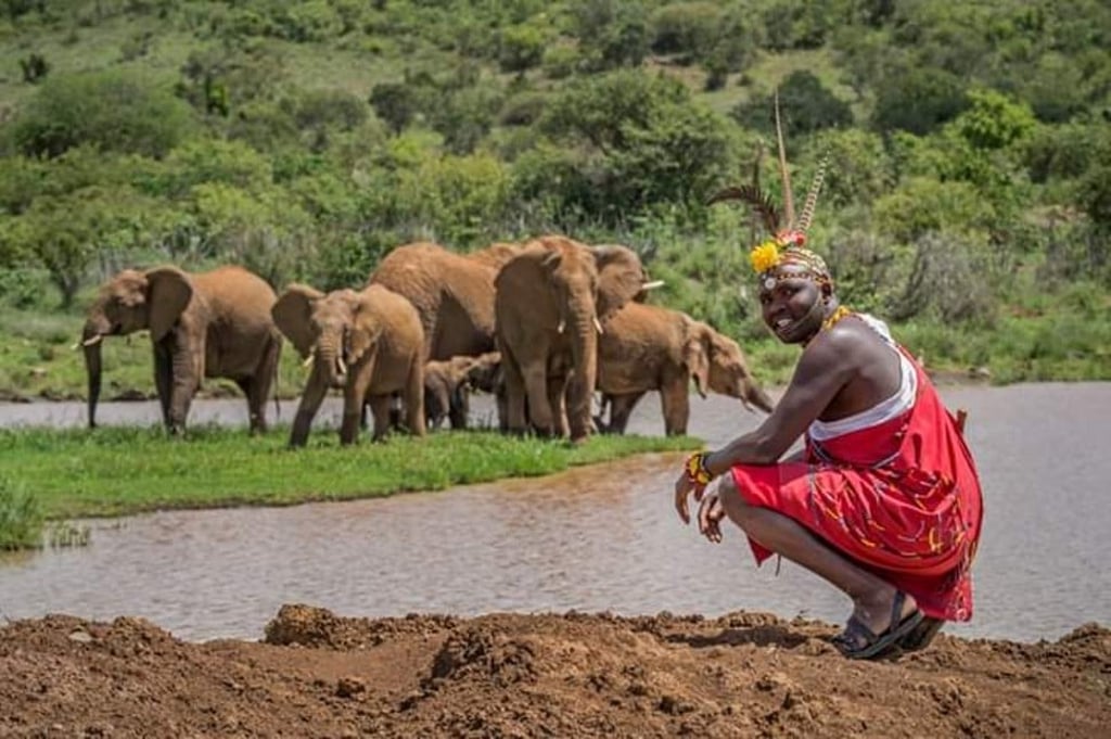 Lengalai with elephants at a watering hole in Kenya’s Loisaba Conservancy. Photo: courtesy of Samuel Lengalai Lengalai with elephants at a watering hole in Kenya’s Loisaba Conservancy. Photo: courtesy of Samuel Lengalai