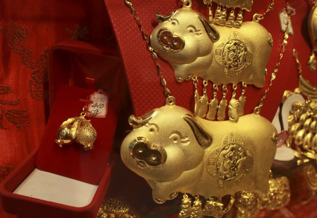 Chinese weddings Why do brides wear huge 24 karat golden pigs around their necks South China Morning Post