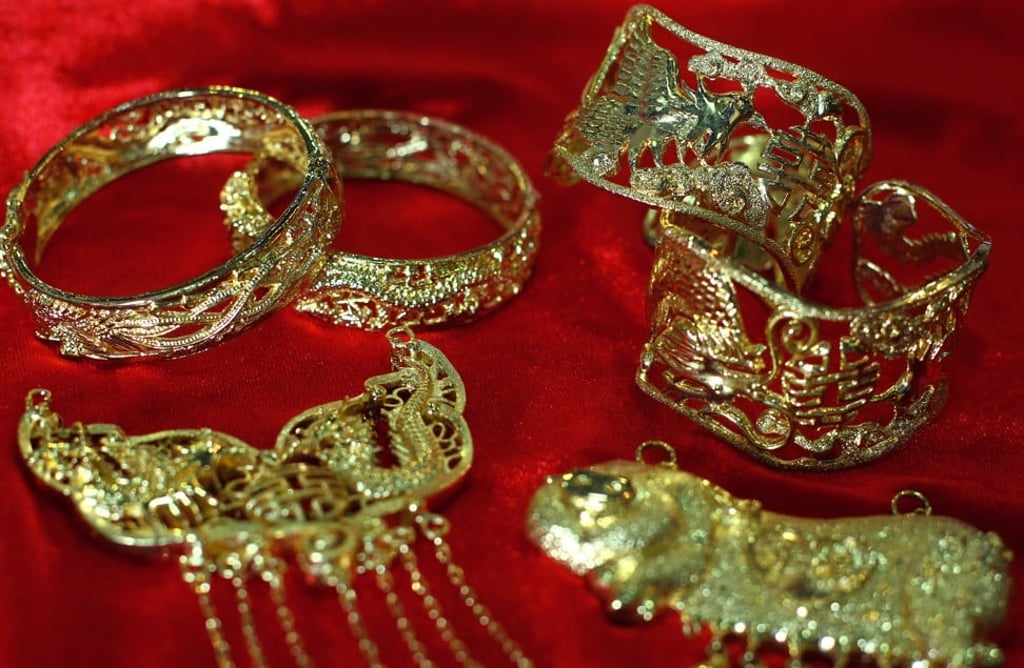 Chinese weddings Why do brides wear huge 24 karat golden pigs around their necks South China Morning Post