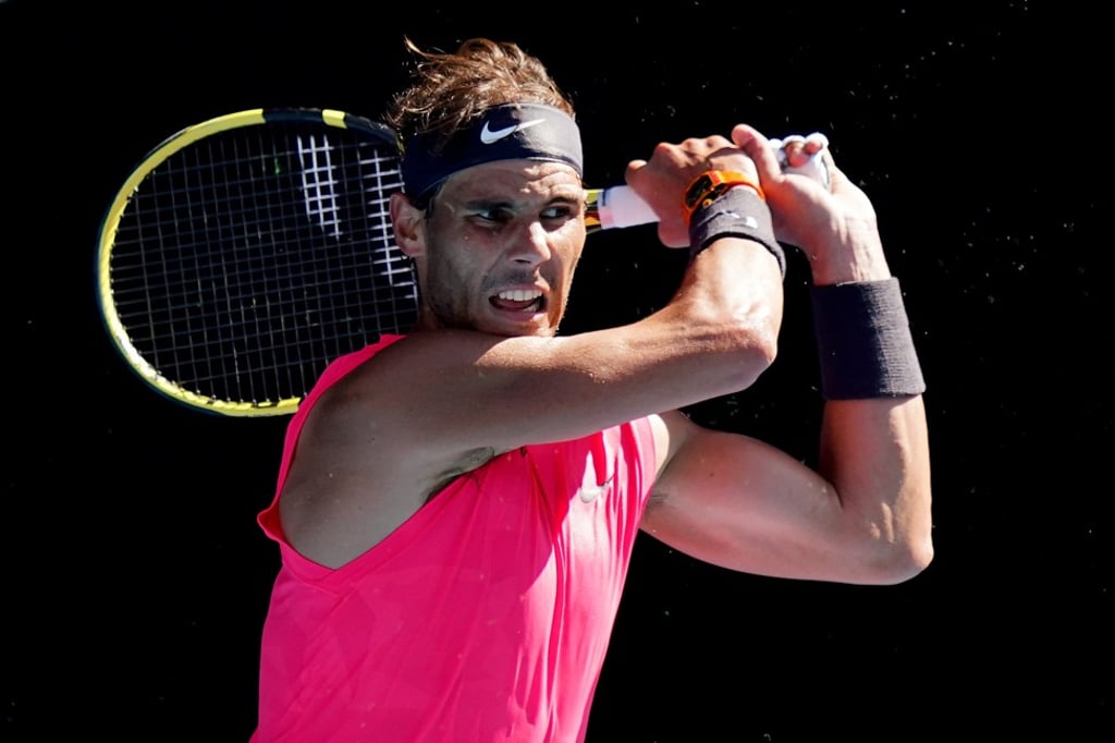 Rafael Nadal returns the ball against Pablo Carreno Busta at the Australian Open. Photo: EPA-EFE